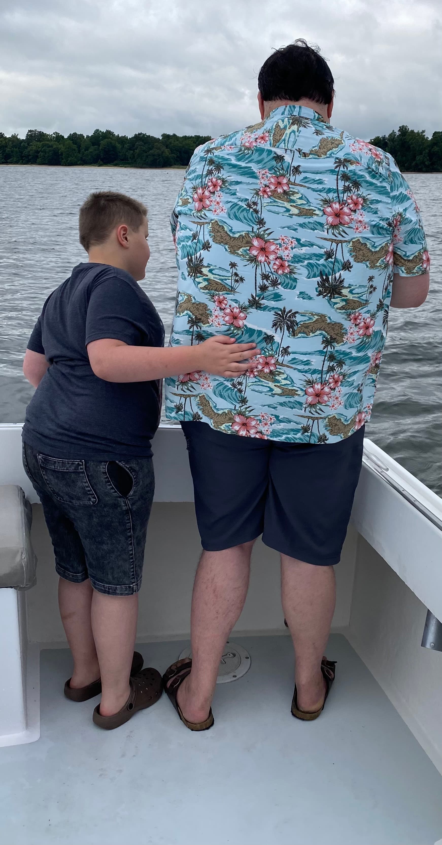 Parker and his father aboard a boat on Chesapeake Bay in 2021